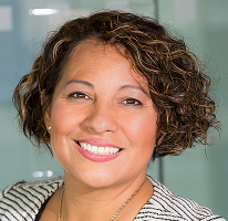 Compliance head Claire Ashford at a financial regulation firm, portrait